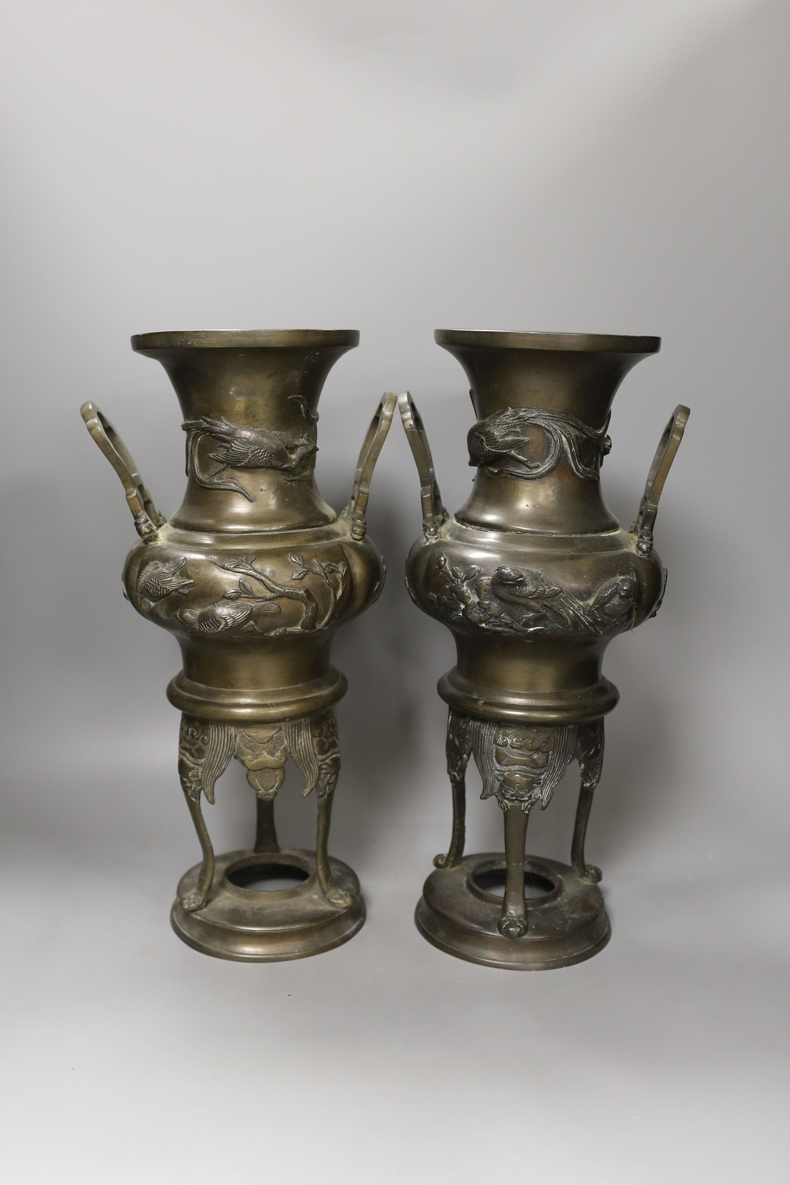 A pair of Japanese bronze vases, one handle a.f. - 40cm tall